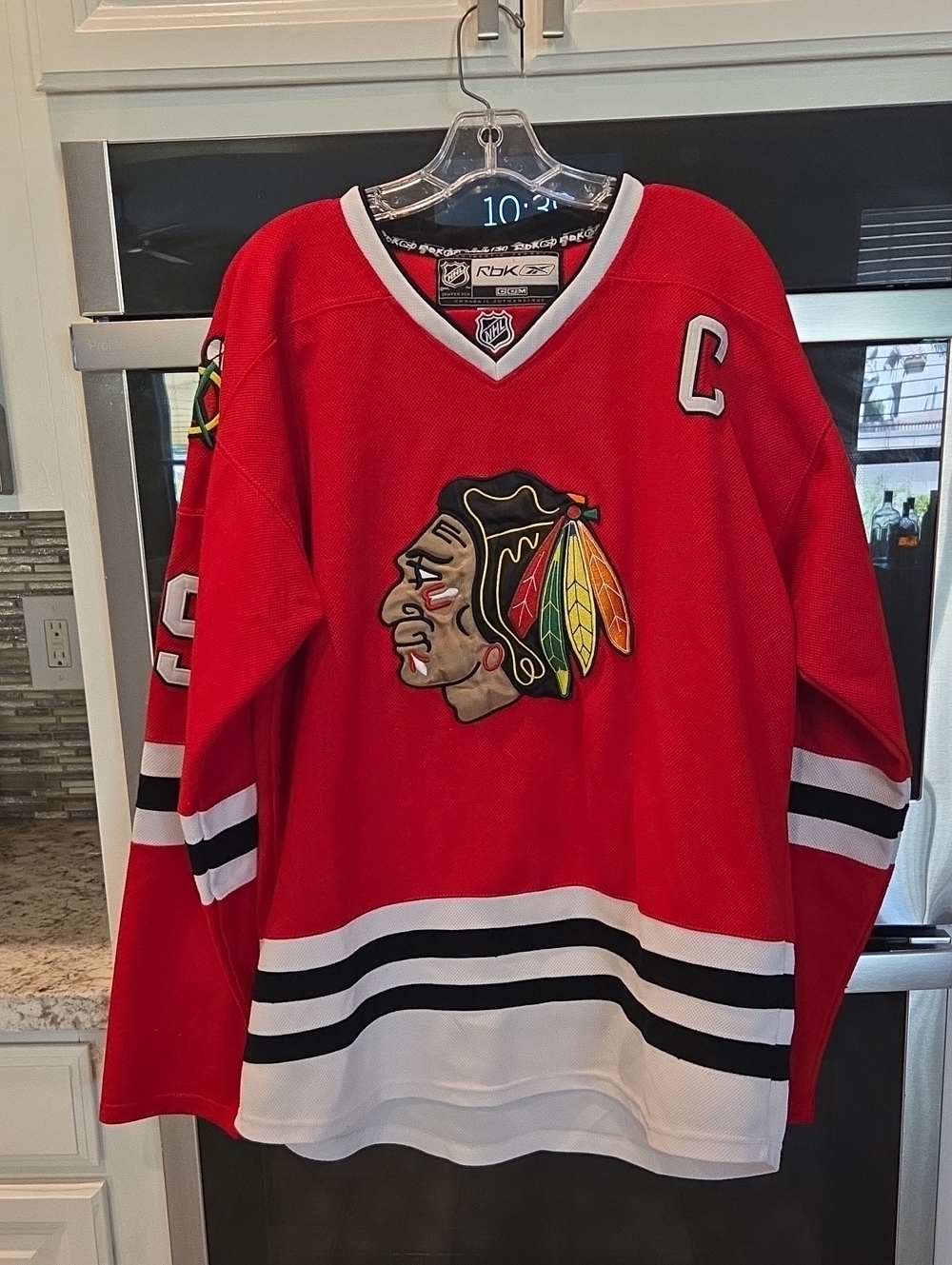 Reebok CCM Red Chicago Blackhawks Men's Hockey Jersey with Captain Patch
